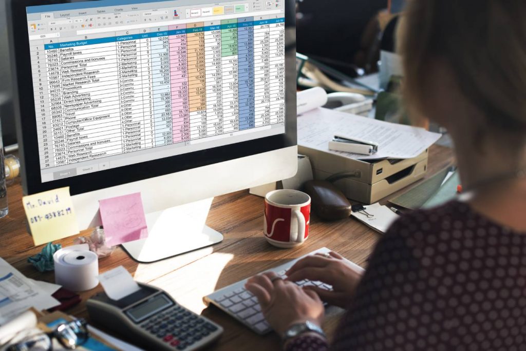 a bookkeeper working with logged business documents